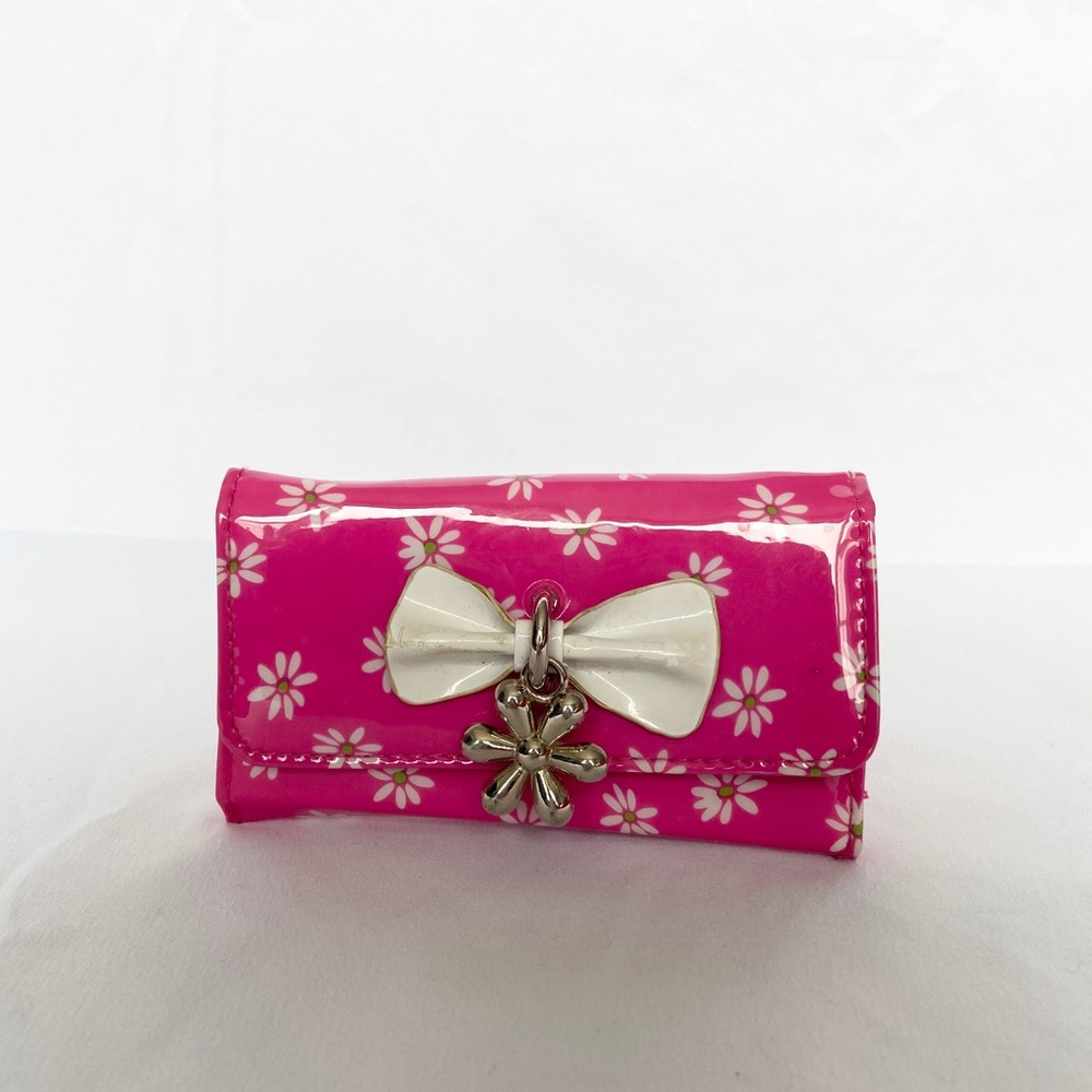 Hot pink Claire’s wallet!